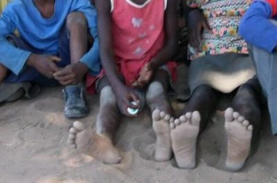 Kids feet in sand Nam